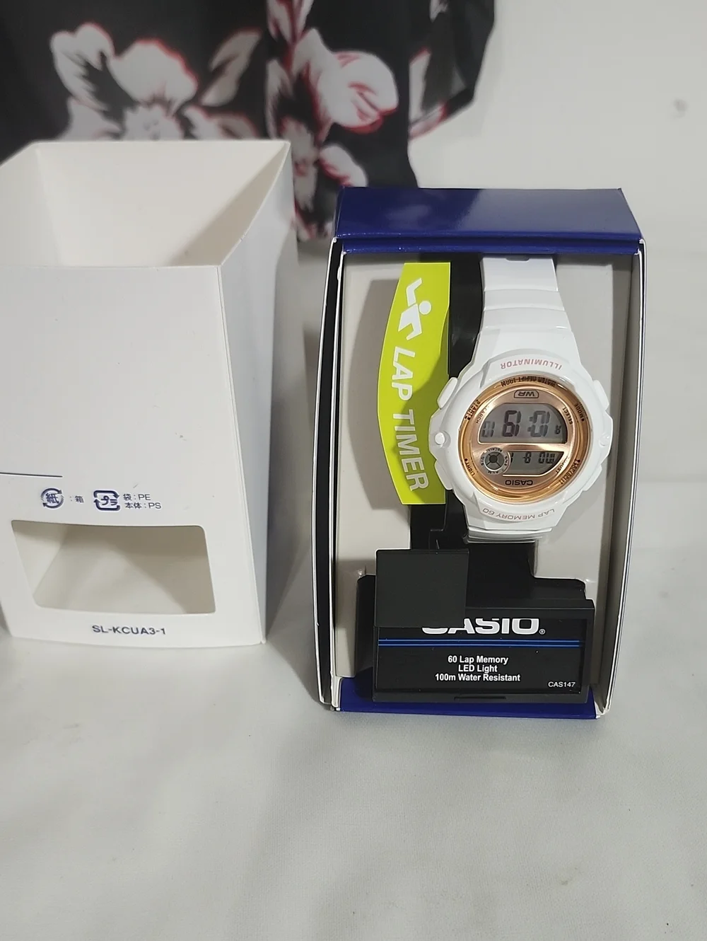 Casio White and Rose Gold Digital Sports Watch with Lap Timer